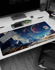 Red planet over jagged mountains desk pad 40x20 inches with starlit teal sky and warm sandy ground.