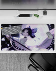 Shinobu Kocho from Demon Slayer on a 32x16 inch mouse pad, in moonlit hues with butterflies, elegant and poised.