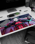 White-haired horned warrior on anime desk pad 40x20 inches, teal circuits and glowing sword slash.