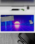 Vivid 32x16 mouse pad combines glowing grids and sunset tones for captivating vaporwave storytelling