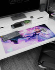 Pink-haired anime girl with cap and ribbon holding a fan on 36x16 inches desk pad, butterflies drifting.