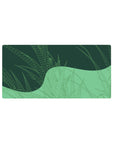 Geometric Grasslands Desk Mat 32x16 featuring green patterns for gaming or workspace energy with calming flair
