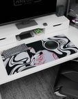 Mystical 36x16 anime desk mat with black and white curves, a feminine silhouette, and soft hints of red and grayscale for an elegant touch