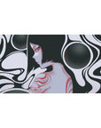 Surreal 40x20 desk pad featuring flowing black and white curves around a mysterious feminine silhouette, accented with hints of red