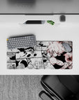 28x12 inches anime mouse pad in heavy blacks and dusty whites with sharp red splatter, intense high-energy vibe.