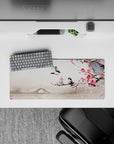 28x12 inches mouse pad with plum blossom and bird design, blending delicate pink flowers, a bridge, and mist for a serene and calming atmosphere.
