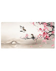 Mouse pad featuring plum blossom and bird design, 32x16 inches, with soft pink blooms, a serene bridge, and gentle mist for a tranquil atmosphere.