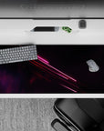 36x16 inches desk pad with neon light design, blending pink and red streaks with a starry backdrop to create a cosmic, tech-inspired workspace.
