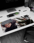 Swirling battle artwork on 36x16 desk pad ideal for fans of Naruto's iconic rivalries