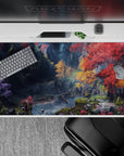 40x20 inches mouse pad showcasing an enchanted fantasy forest with autumn colors, peaceful stream, and magical light filtering through trees.