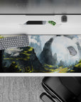 Serene 36x16 desk pad featuring majestic cliffs, stone arches, and lush terraces, perfect for a calming, otherworldly workspace vibe