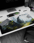 Majestic 40x20 anime desk mat featuring stone arches, lush terraces, and misty cliffs for an ethereal, serene desk environment