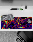 32x12 inches mouse pad with swirling neon hues, featuring electric purples, fiery reds, and luminous yellows for a dynamic, bold workspace look.