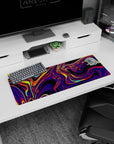 Artistic 32x12 inches mouse pad featuring swirling neon hues, with electric purples, fiery reds, and luminous yellows for a mesmerizing design.