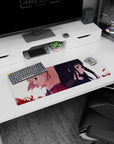 Two anime schoolgirls back to back—blonde with red ribbon and black-haired violet eyes—mouse pad 32x12 inches.