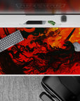 40x20 inches desk pad showcasing Guts surrounded by intense red and orange flames, capturing the raw fury and energy of the Berserker Armor, perfect for passionate fans.