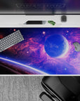 Galaxy-themed desk pad 40x20 inches featuring violet and blue clouds with stars, adding color to any workspace.