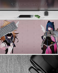 Moody pastel anime desk pad 40x20 inches in blush pink with midnight blue hair, pink streak, and fleur accents.