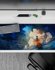36x16 inches desk pad with the Thousand Sunny from One Piece, capturing the ship sailing boldly through the ocean with an epic backdrop.