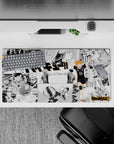 Black-and-white manga panels with bright orange accents anime mouse pad 32x16 inches, high-energy vibe.