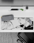 32x12 inches monochrome anime mouse pad, deep inks and clean whites for an intense, high-energy desk vibe.