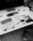 36x16 inches anime desk mat showing two rivals mid-shout, sweat flying, chain necklace pulled tight.