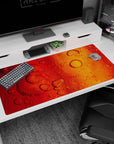 Artistic design on 40x20 desk mat perfect for adding warmth, fluidity, and creative flair to your setup or decor