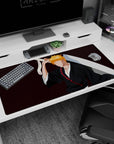 Anime desk pad featuring Ichigo Kurosaki from Bleach, size 40x20 inches, minimalist design with black robes and orange hair.