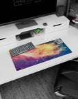 Star-speckled space window scene mouse pad 28x12 inches with hazy nebula swirls and glowing cloud streaks.