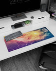 Star-speckled space window scene mouse pad 32x12 inches with cloudlike nebula fading to blue.