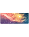 Candy-sky nebula desk mouse pad 32x12 inches with swirls, haze, and soft light bursts.