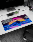 Modern 32x16 inches mouse pad featuring vibrant neon colors and a wireframe landscape under a massive neon sun.