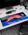 Artistic 36x16 inches desk pad with a neon sunset and wireframe landscape, capturing the essence of vaporwave style in vibrant hues.