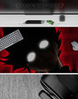 Dark red and black anime desk pad 40x20 inches, high-contrast glow-eyed portrait, late-night mood.