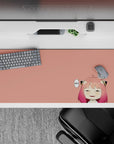36x16 inches anime girl desk pad in soft peach with pink-to-rose hair fade, cozy cheeky vibe, blush accents.
