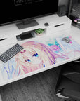 40x20 inches desk pad showing a golden-blonde anime girl with angel wings gazing wistfully amid petals.