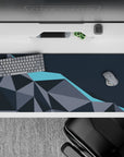 Striking 36x16 desk pad highlights sharp gray and blue hues with intricate geometric details in stunning simplicity