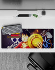 Playful 32x12 mouse pad features Luffy's iconic grin for fans of One Piece's adventurous spirit