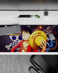 Striking 36x16 desk pad highlights Luffy's iconic grin and adventurous energy for fan admiration