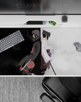 40x20 inches desk pad with Sasuke and Itachi in a powerful standoff, showcasing their complex relationship and emotional intensity.