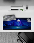 Serene 28x12 mouse pad with a glowing full moon, towering peaks, and a starry sky, perfect for bringing the beauty of the night to your desk
