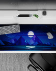 Peaceful 36x16 desk pad featuring a glowing full moon, starry sky, and towering mountain peaks, perfect for cosmic inspiration