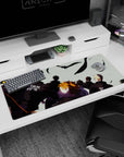 Orange-haired player foreground, team marching ahead on anime desk pad 36x16 inches with Japanese text.
