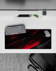 Compact 28x12 desk mat highlights black and red contrasts for immersive focus and gaming vibes