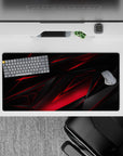 Energetic 32x16 desk mat combines bold red accents and sharp black lines for impactful yet stylish visuals