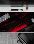 Dynamic 40x20 desk pad showcases bold angles and striking contrasts for a high-energy workspace or gaming setup