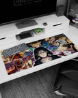 Artistic 36x16 inches mouse pad with Eren facing his destiny, surrounded by electrified Titan shifters in a battle-filled warzone.