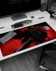 Large 40x20 inches desk pad with Guts in his Berserker Armor against a fiery red backdrop, perfect for adding fierce energy and intensity to your workspace.