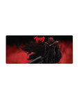 Mouse pad featuring Guts in his Berserker Armor with a fiery red backdrop, 28x12 inches, perfect for adding primal rage and intensity to your workspace.