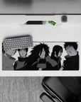 32x12 inches anime mouse pad in moody grayscale with red Sharingan pops and a purple Rinnegan.